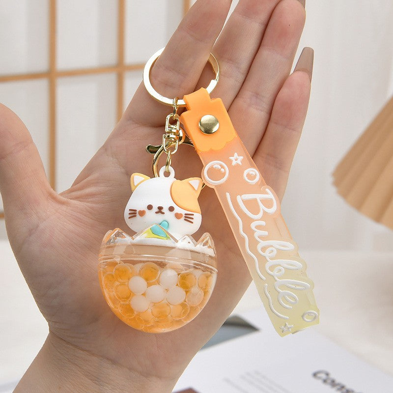 Wholesale Acrylic flowing sand bottle bag keychain