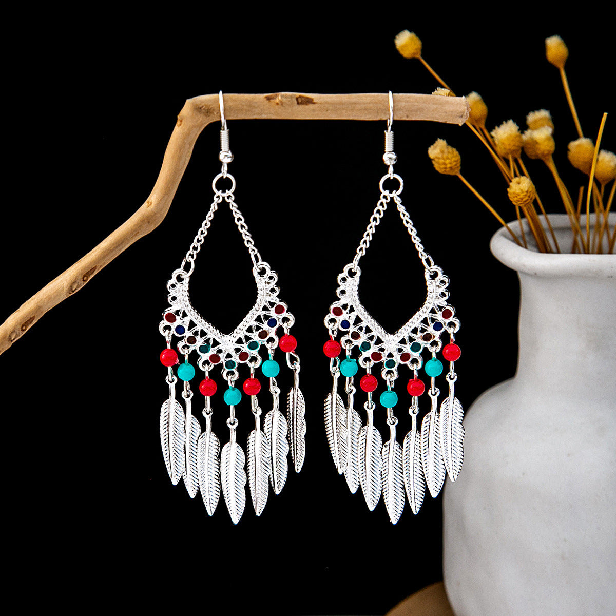 卸売ヴィンテージエスニックスタイルベルタッセル中空合金イヤリング