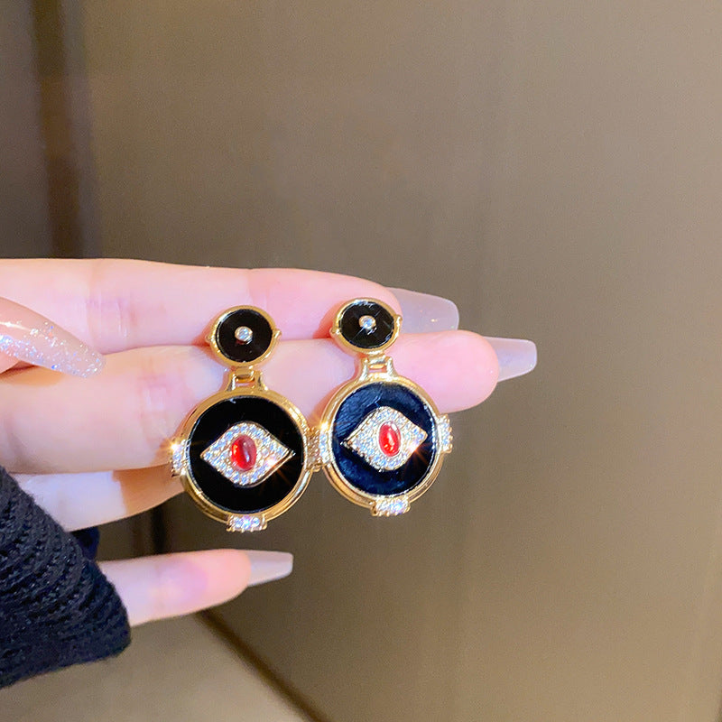 Wholesale Eye Round Alloy Earrings