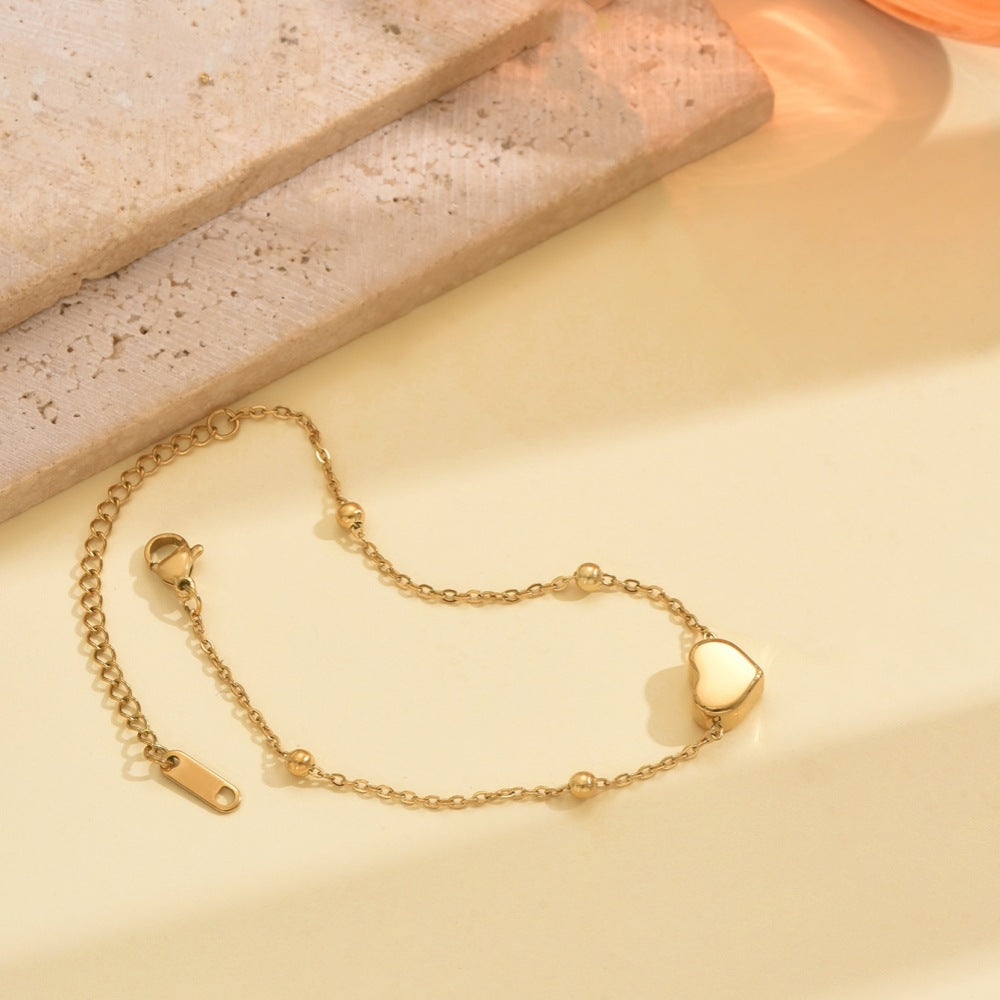 Wholesale Stainless steel gold heart shaped necklace and bracelet