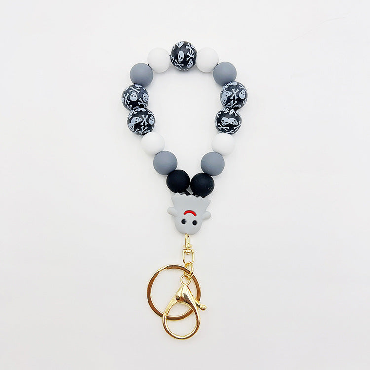 Wholesale Silicone Pumpkin Cow Ghost Dog Paw Wooden Bead Bracelet Keychain