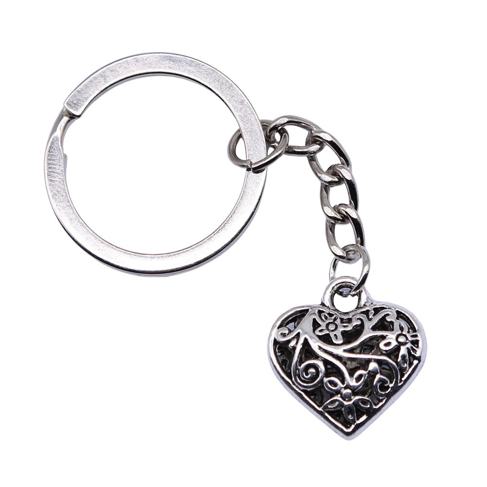 Wholesale 10PCS Three-dimensional Hollow Heart Pendant Metal Keychain