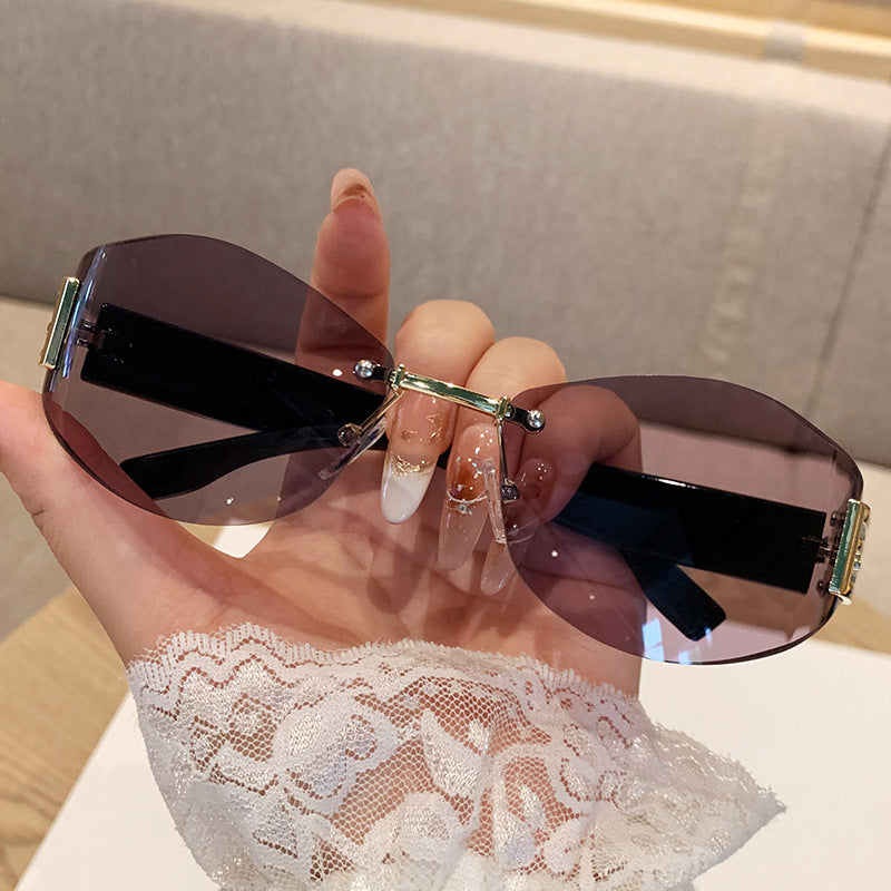 Wholesale Retro rimless oval curved lens sunglasses