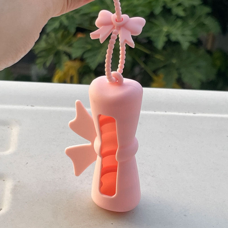 Wholesale Lipstick case silicone protective case bow lipstick bag keychain