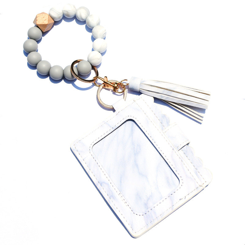 Wholesale Silicone Bead Bracelet Card Holder Tassel Wallet Keychain