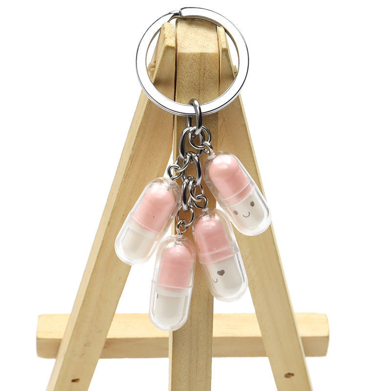 Wholesale Acrylic Cute Smiley Face Capsule Pendant Keychain