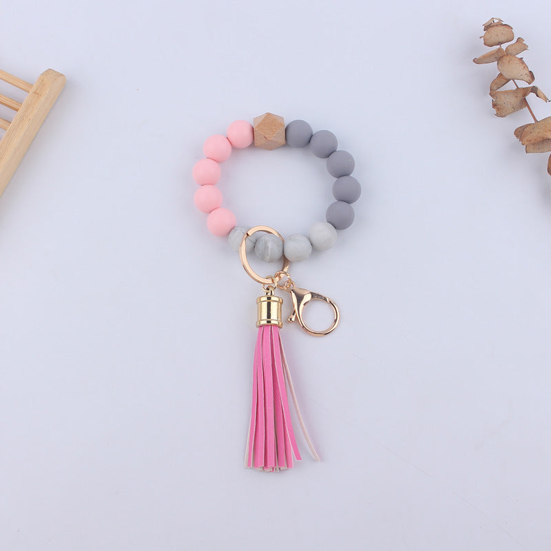 Wholesale Silicone Leather PU Short Tassel DIY Leopard Beaded Bracelet Keychains