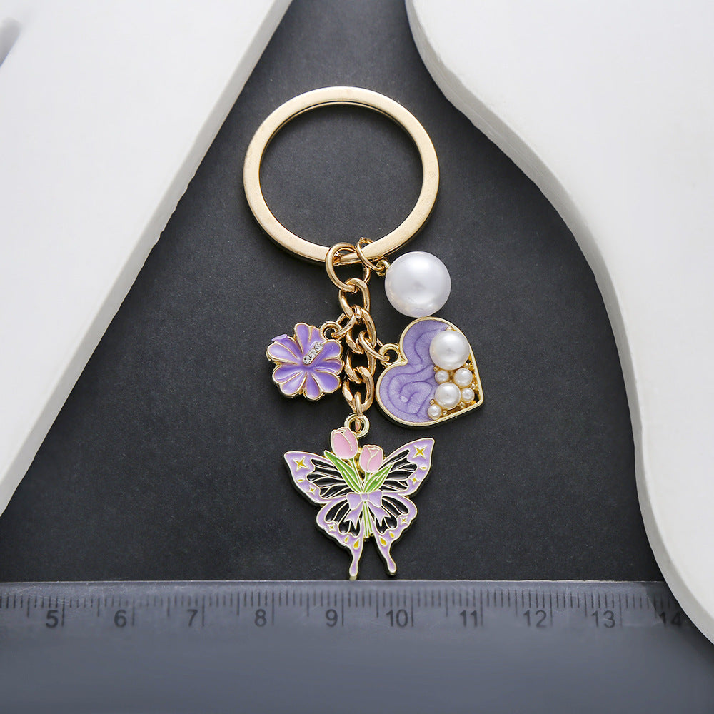 Wholesale New Product Oil Dropping Purple Love Pearl Simulation Tulip Flower Butterfly Keychain Jewelry Luggage Pendant