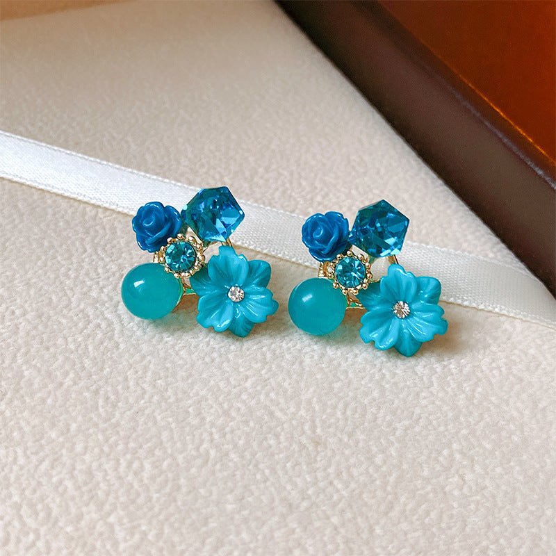 Wholesale Diamond studded cat eye stone crystal flower earrings