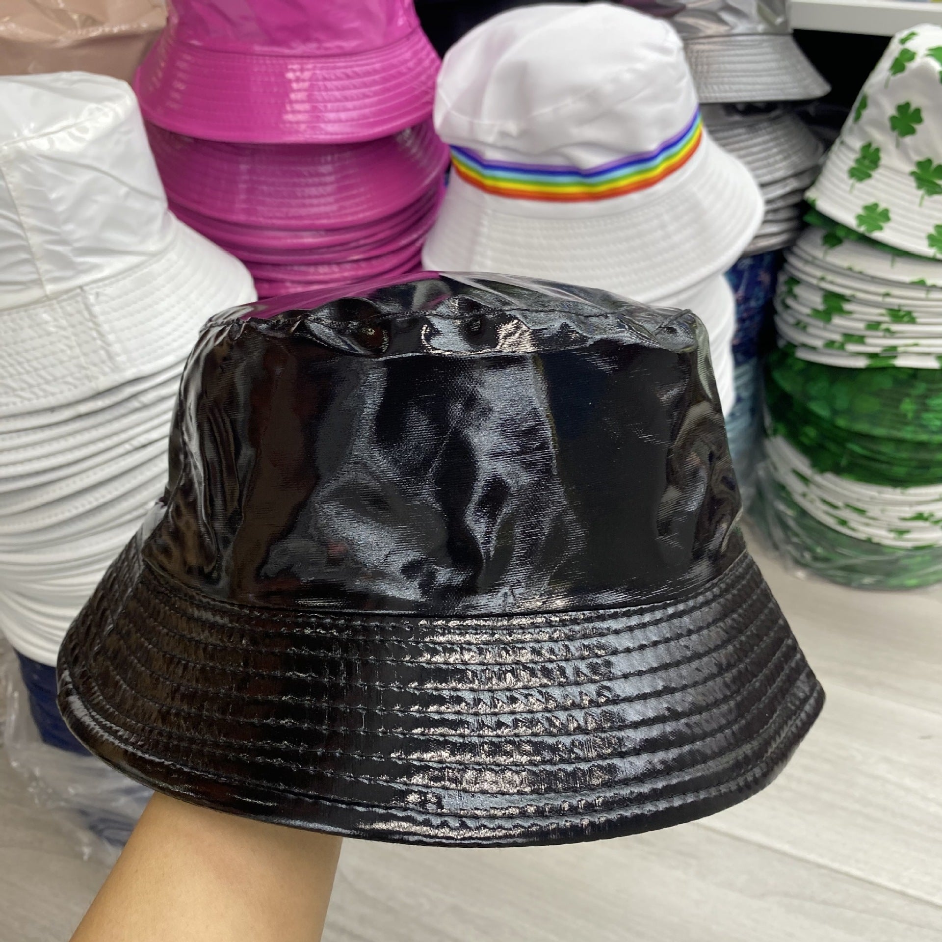 Wholesale of Solid Color Patent Leather with Polyester Fisherman Hats on Both Sides