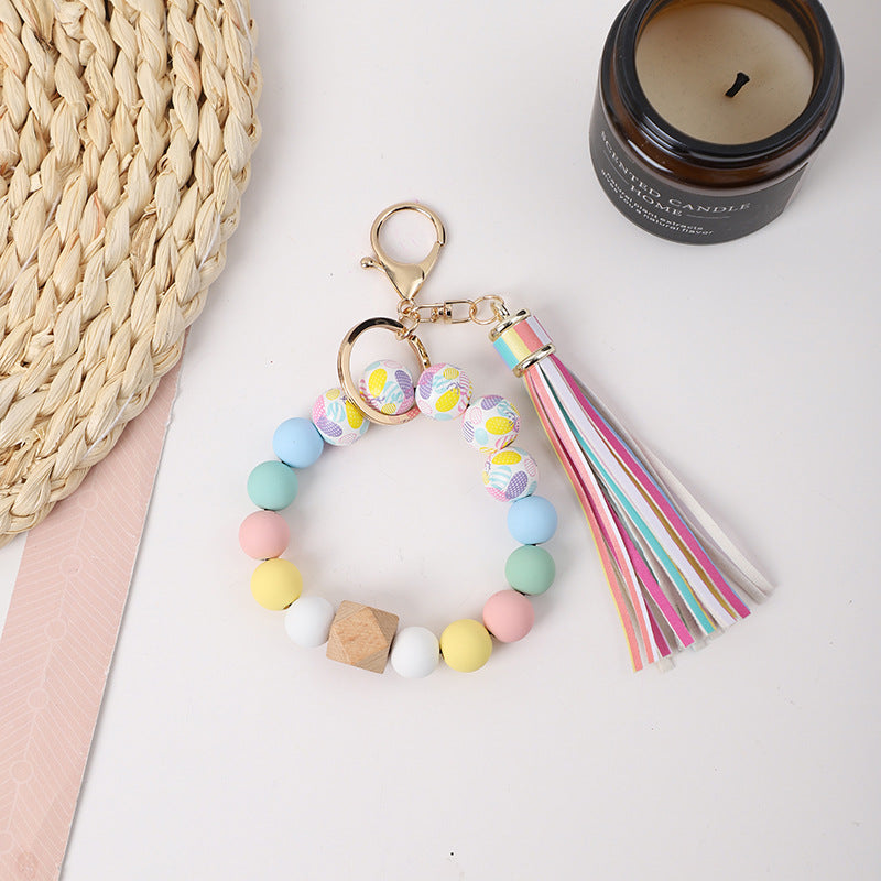 Llavero de muñeca de silicona de borla al por mayor