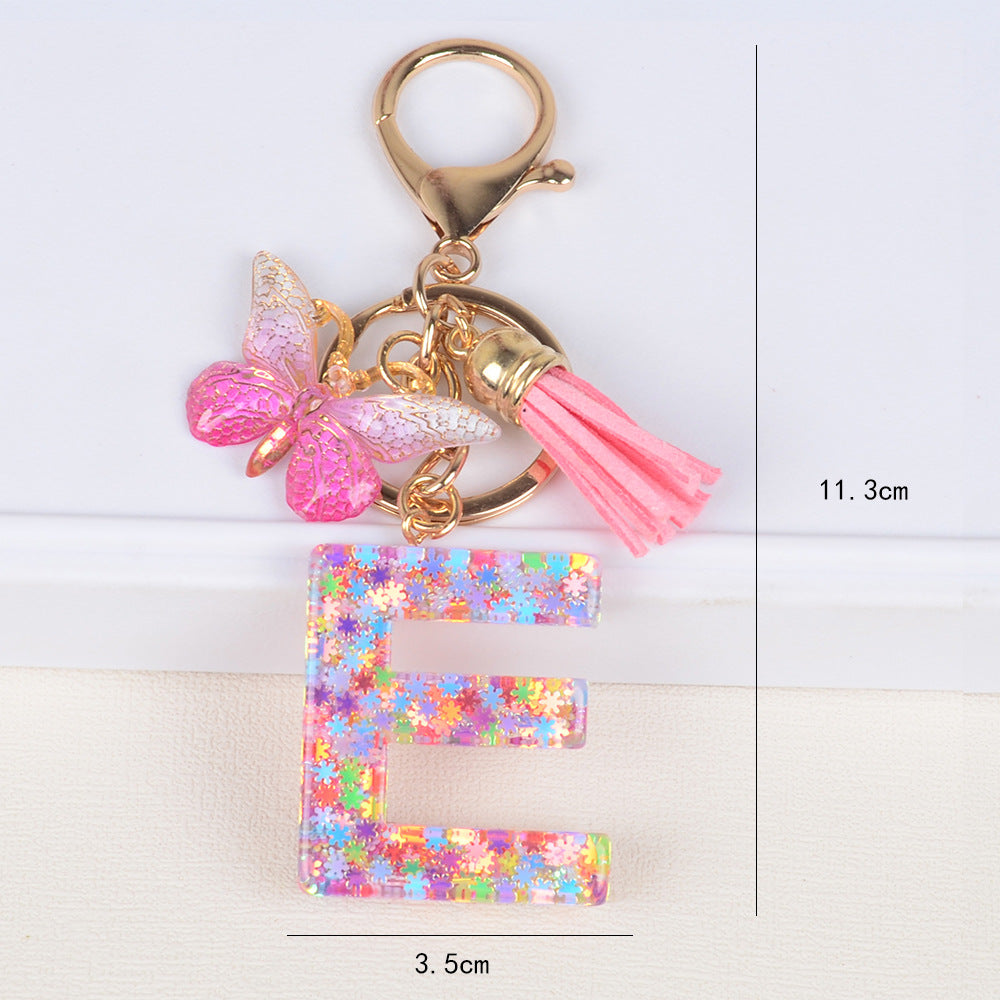 卸売スパンコールスノーフレークレター樹脂キーホルダー
