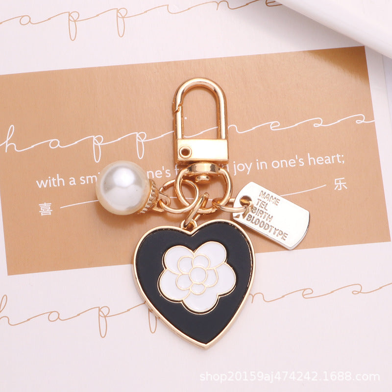 Wholesale Love Fabric Pearl Chain Alloy Keychains
