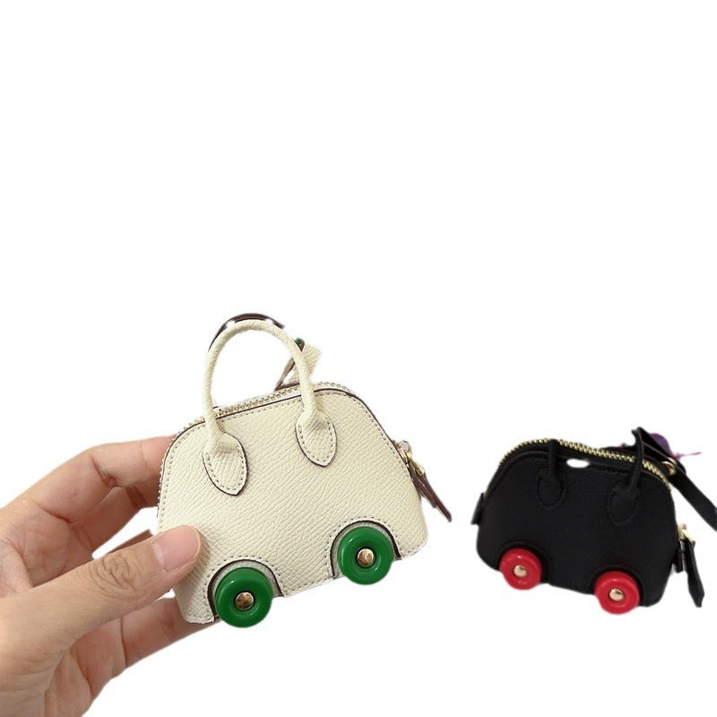 Wholesale Mini wheel shell bag cute lipstick earphone bag