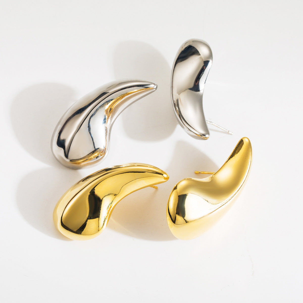Wholesale Teardrop-shaped Glossy Simple Comma Earrings