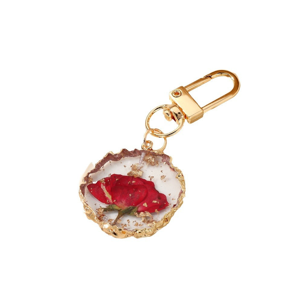 Wholesale Creative Frosted Epoxy Dried Flower December Flower Keychain