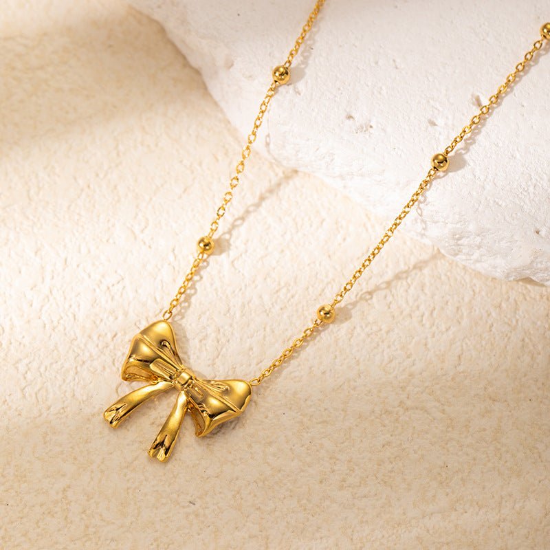 Wholesale titanium steel necklace gold luxury creative bow necklace