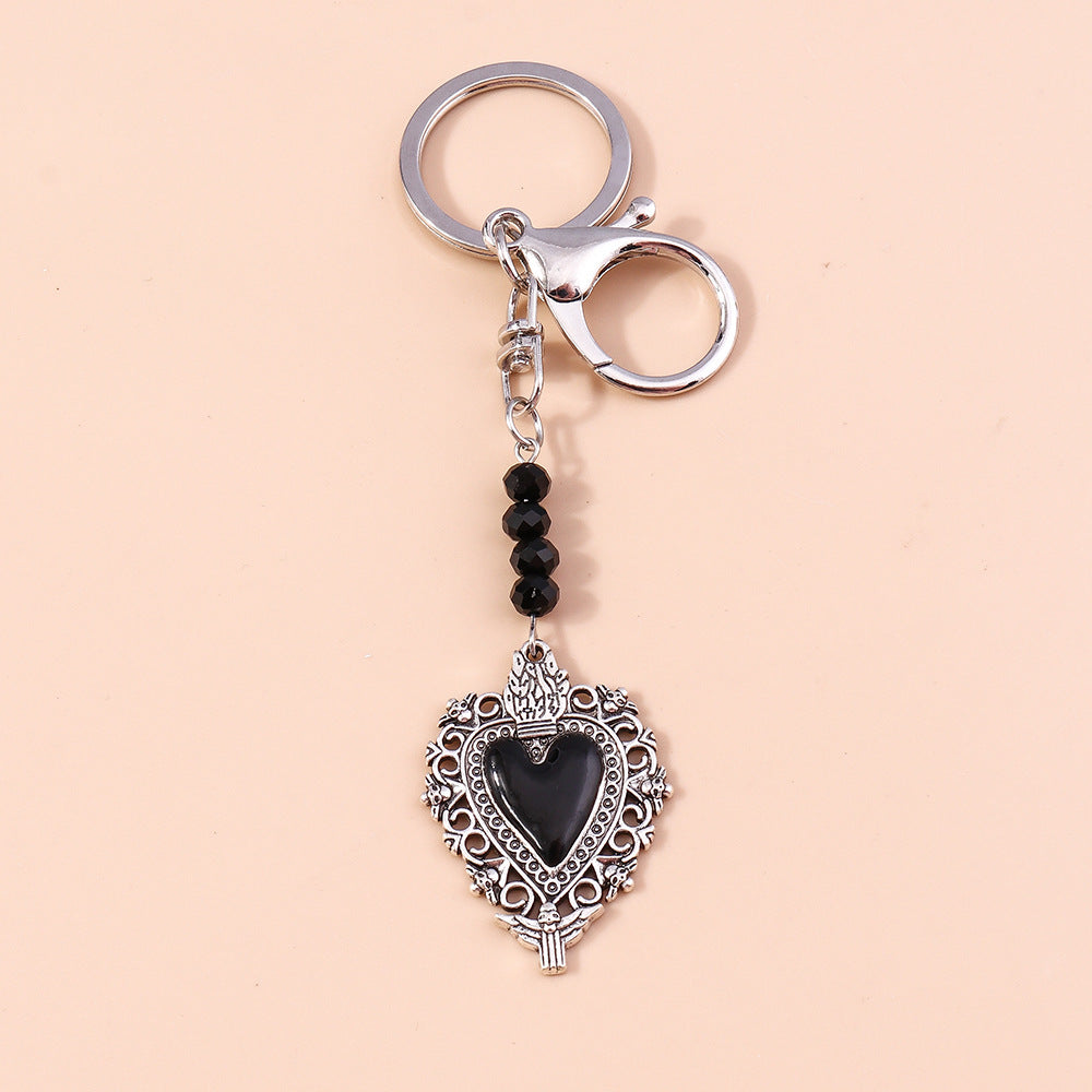 Wholesale Butterfly Cross Hollow Lace Love Devil Eyes Keychain