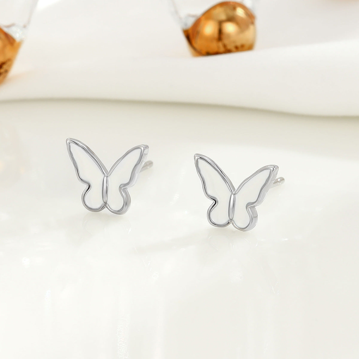 Wholesale S925 Drop Glazed White Butterfly Sterling Silver Earrings
