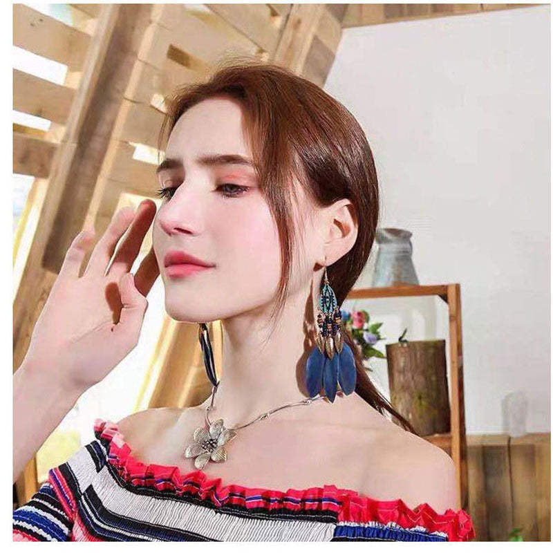 Wholesale Retro Pattern Long Rice Bead Tassel Earrings