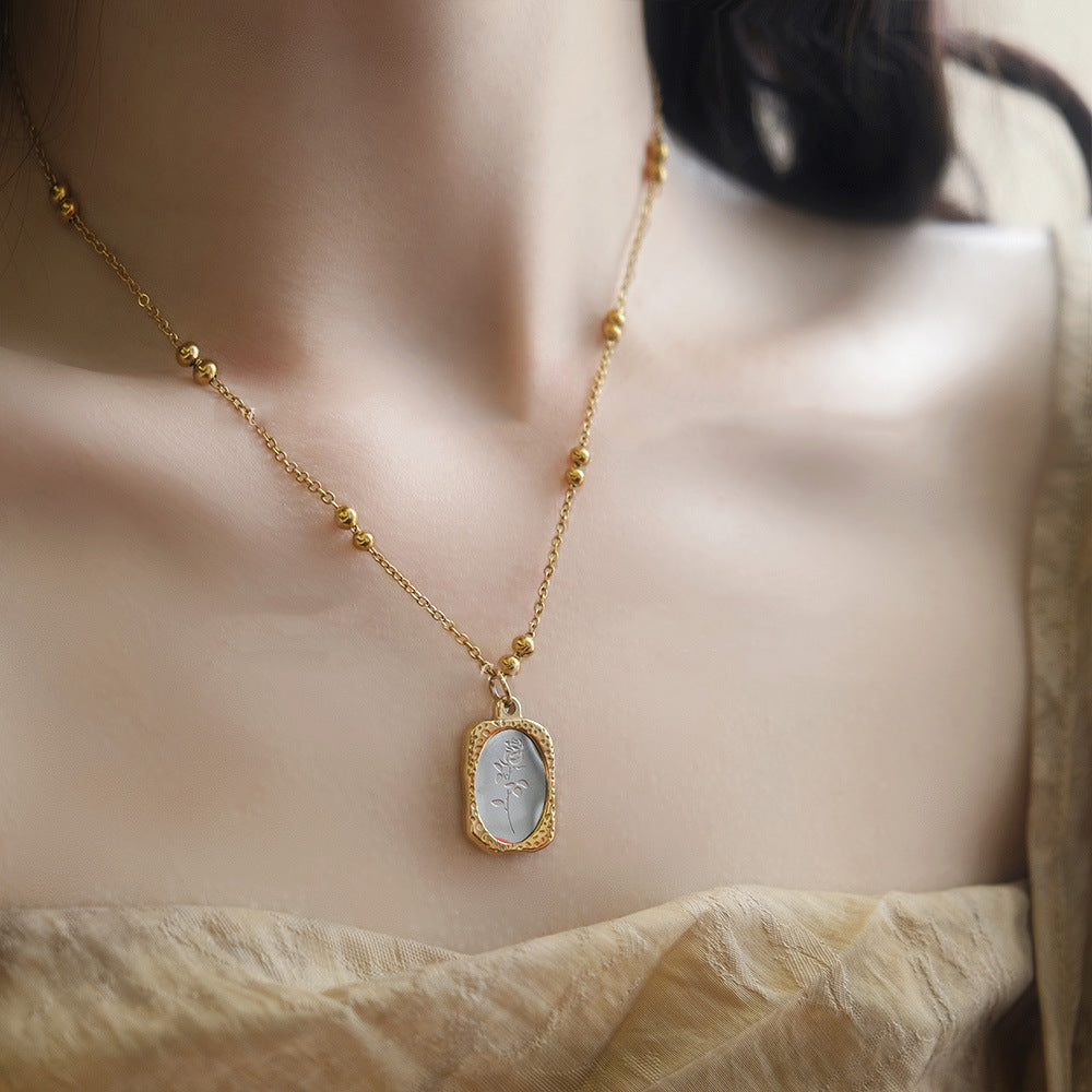 Wholesale Light Embossed Magic Mirror Rose Titanium Steel Necklace