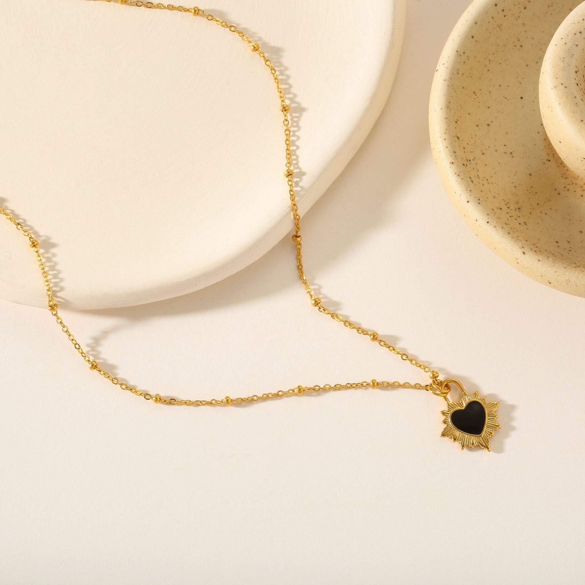 Wholesale Titanium steel gold peach heart non-fading temperament wear cold style neutral necklace