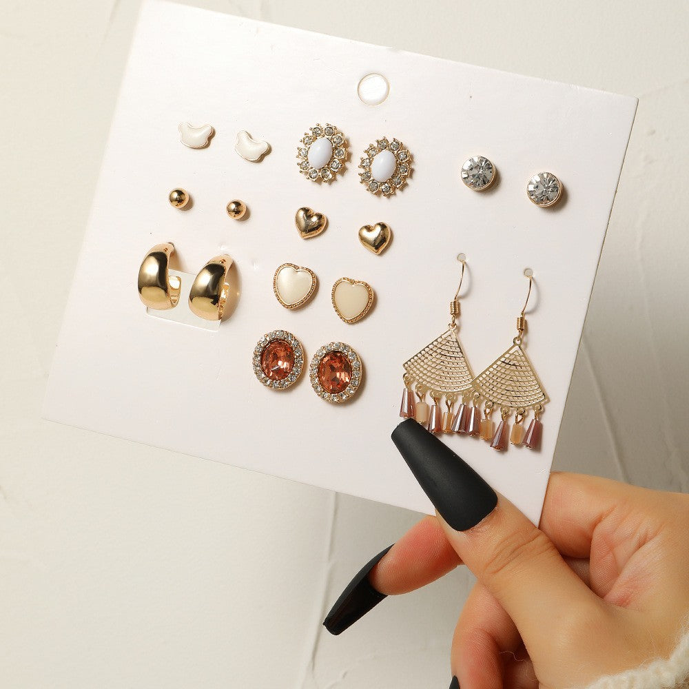 Pendientes de pernos pequeños de aleación al por mayor para pendientes de una semana