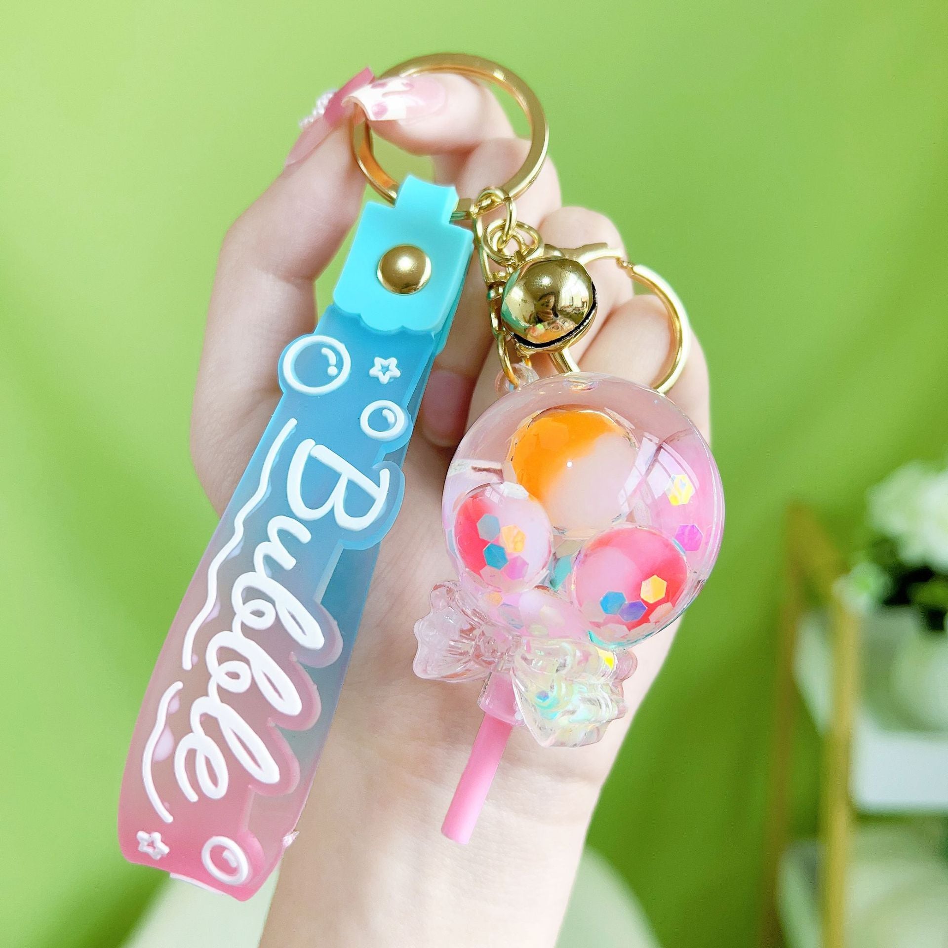 Botellas de burbujas de burbujas de luz nocturna al por mayor llavero acrílico
