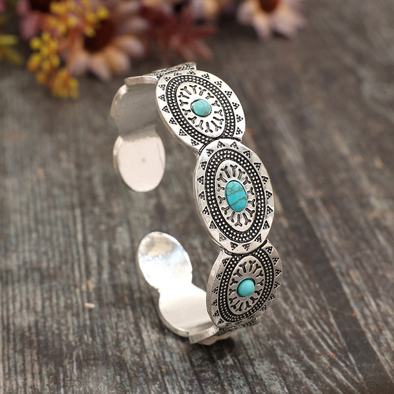 Wholesale Bohemian retro style oval inlaid synthetic turquoise open alloy bracelet