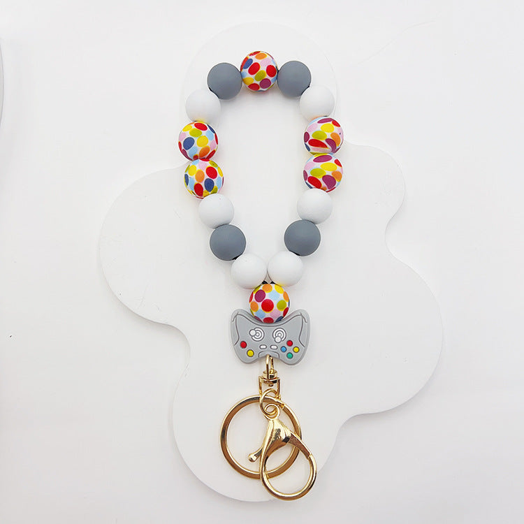 Wholesale Silicone Pumpkin Cow Ghost Dog Paw Wooden Bead Bracelet Keychain