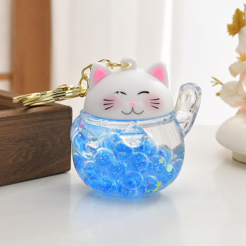 Wholesale Acrylic flowing sand bottle bag keychain