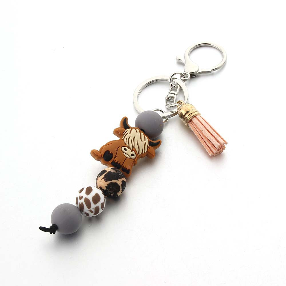 Wholesale Cartoon Cow Tooth Silicone Bead Keychain