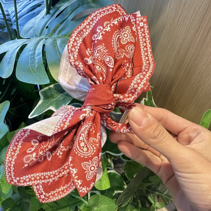 Wholesale Double-sided Cashew Flower Heart Bow Summer Holiday Fashion Hairpin