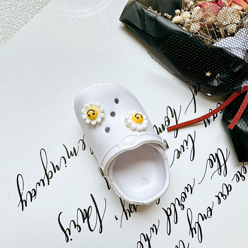 Zapatillas de cara sonrientes al por mayor soporte de airbag de teléfono móvil de plástico