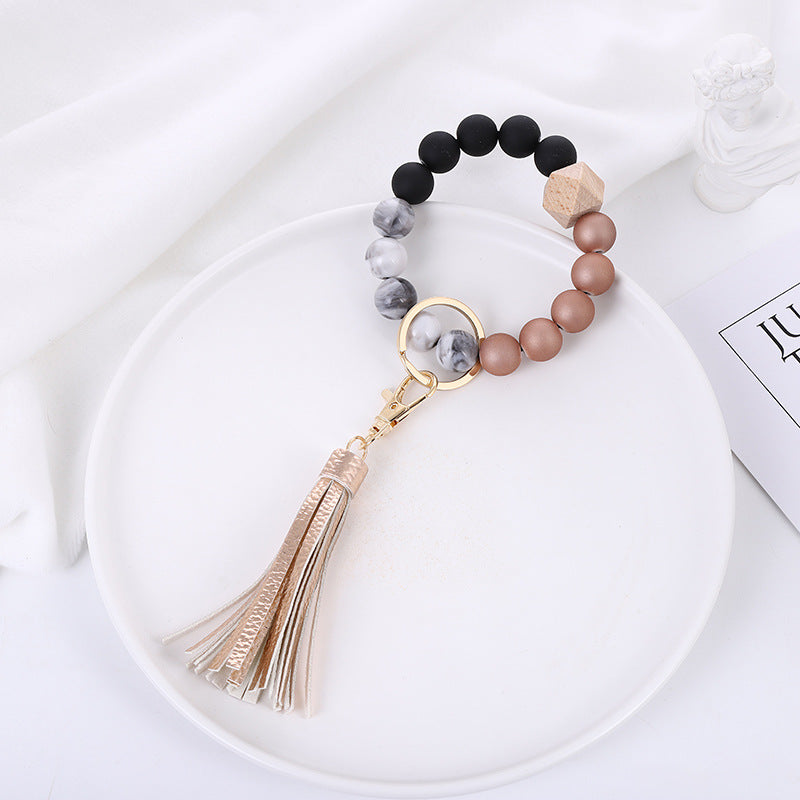 Wholesale Acrylic Beads Wooden Beads PU Tassel Bracelet Keychain