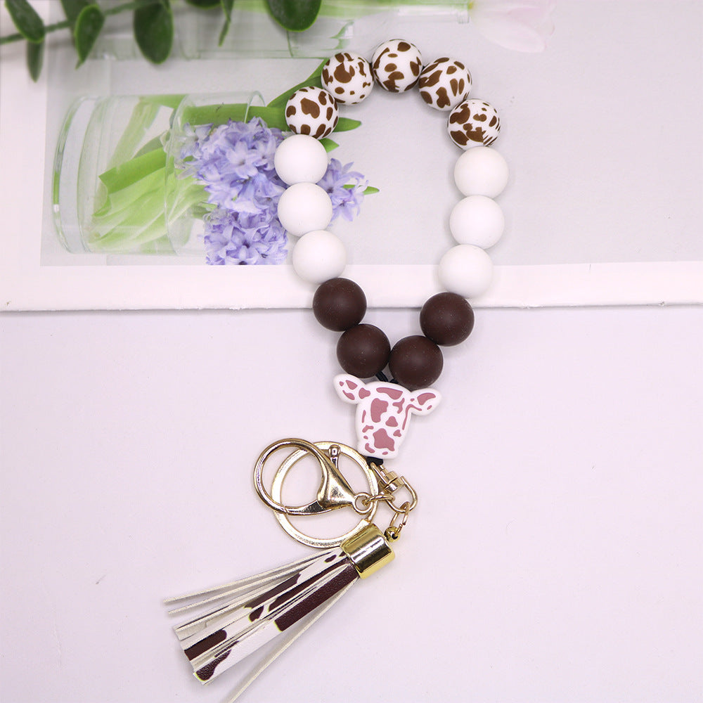 Wholesale Cow Pattern Cow Head Silicone Beaded Wrist Keychain
