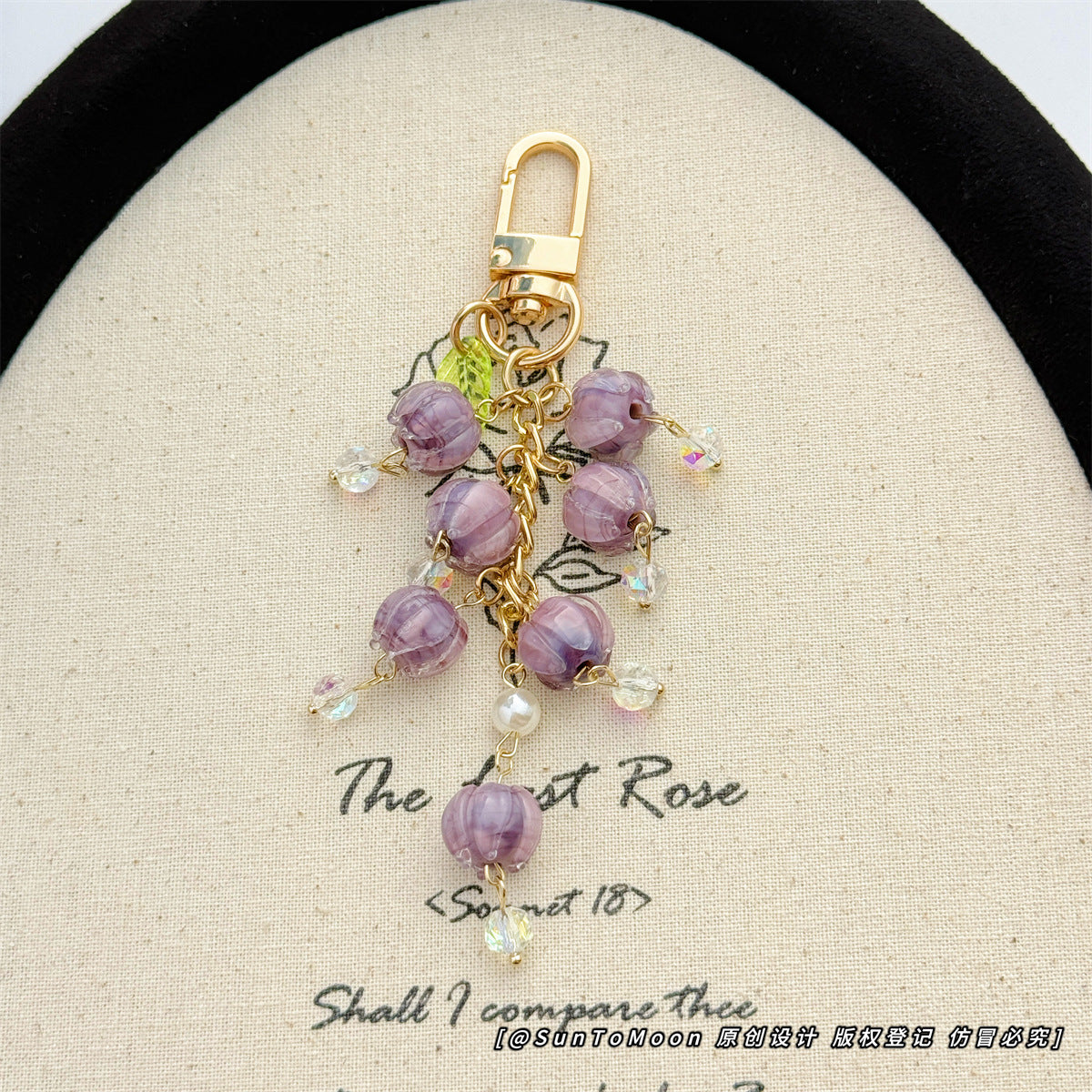 Wholesale Purple glazed bell orchid pearl chain keychain