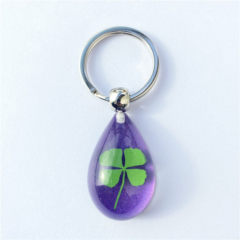 Wholesale 12pcs Four-leaf Clover Luminous Keychain