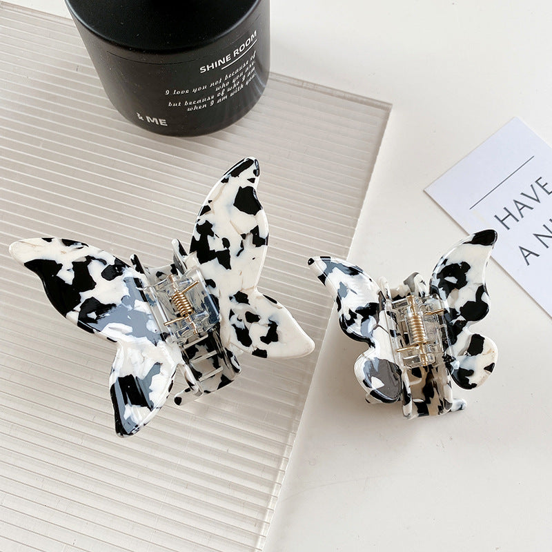 Wholesale Cow Black and White Medium Hollow Acetate Plate Hair Clips