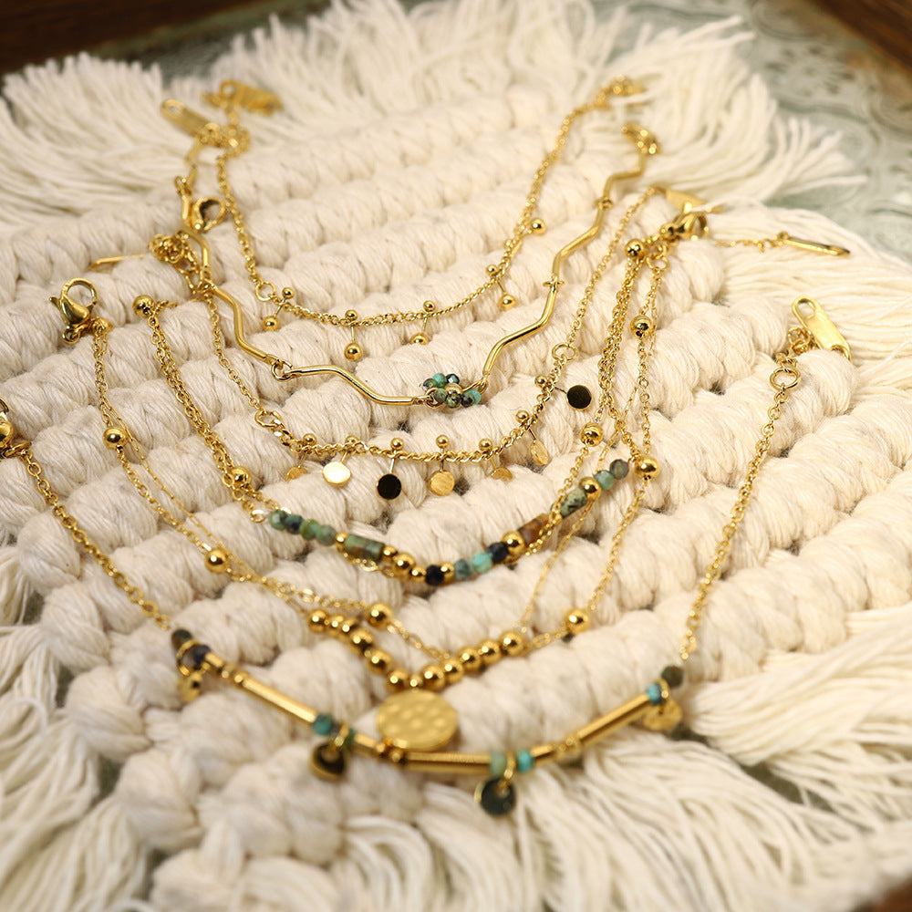 Wholesale Natural stone titanium steel French retro light luxury stacking African turquoise bracelet