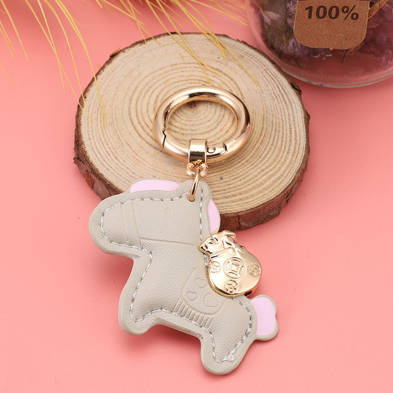 Wholesale Immediately get rich handmade cow leather car keychain pendant