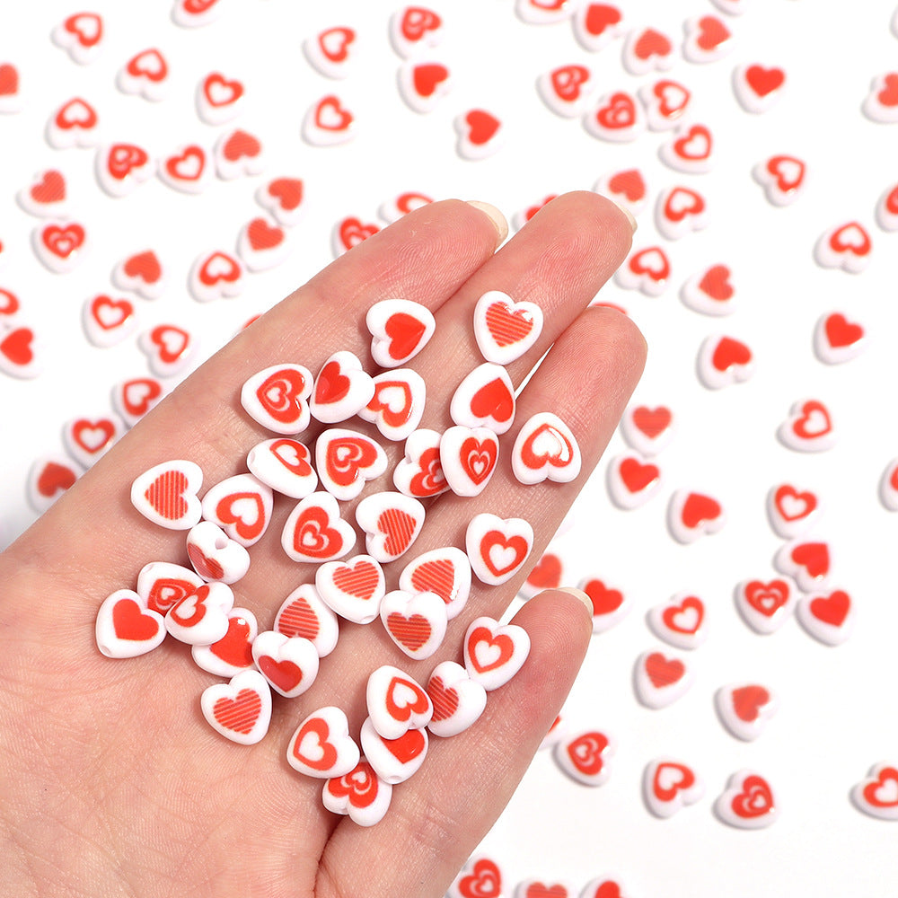 アクリル赤小サイズハート型縦穴ルースビーズ 100 個/パックの卸売