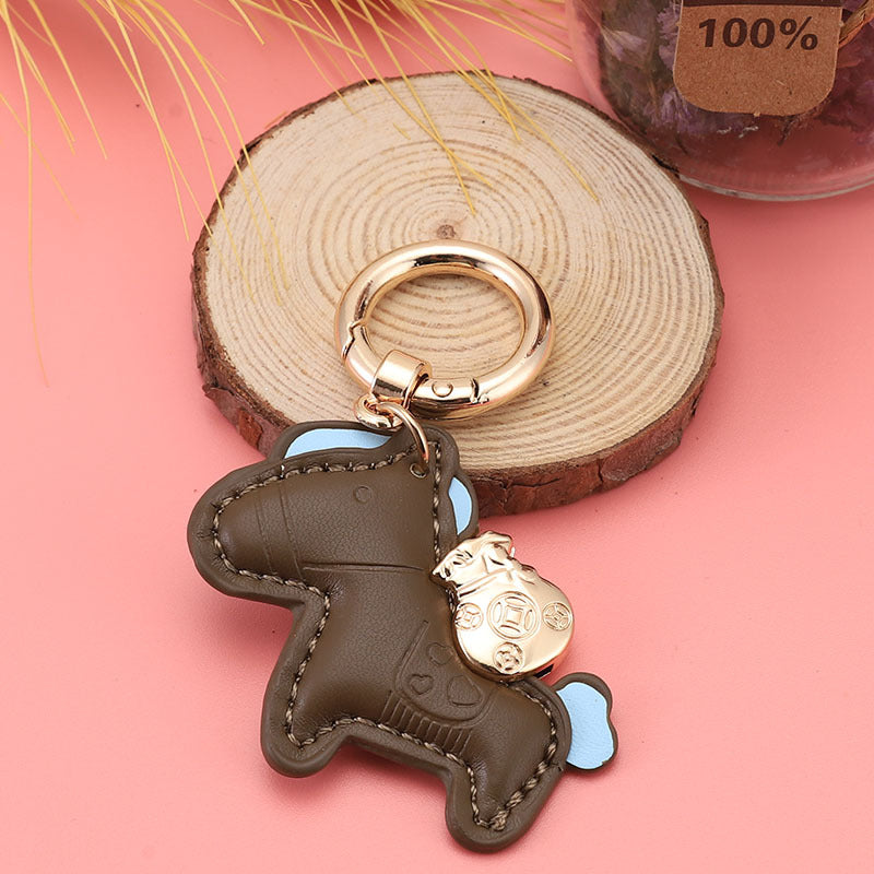 Wholesale Immediately get rich handmade cow leather car keychain pendant