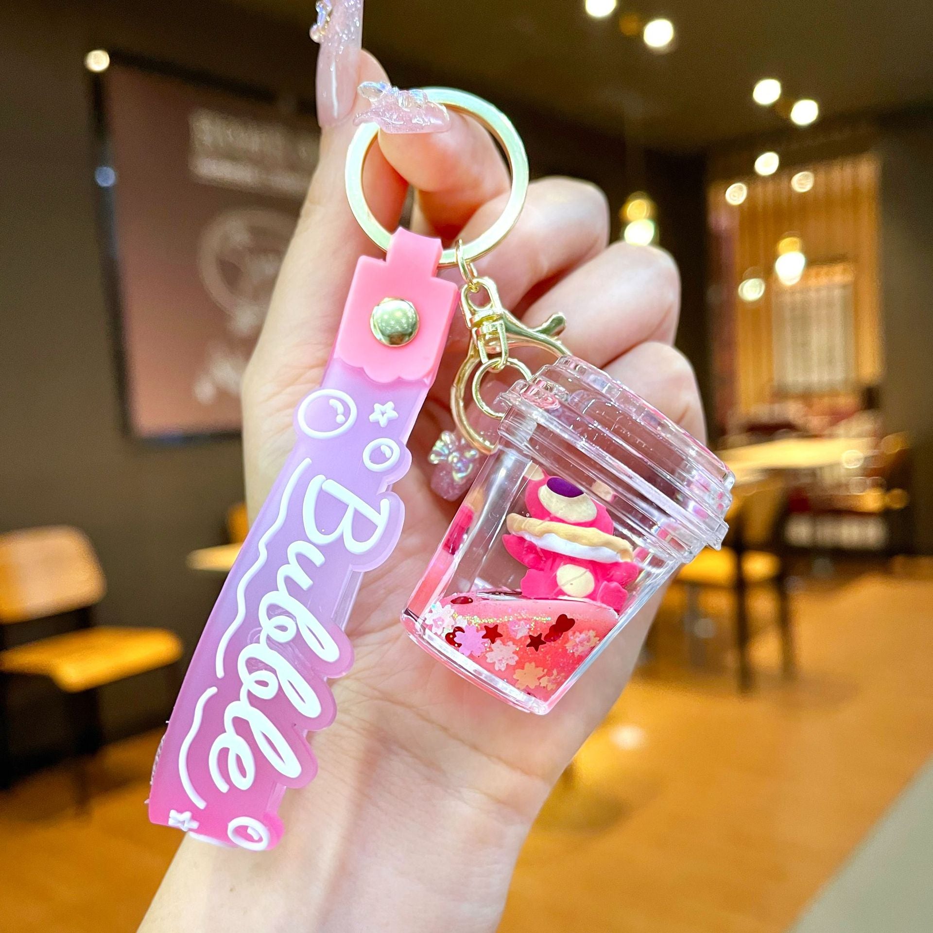 Wholesale Oil filled pink strawberry bear quicksand Keychains