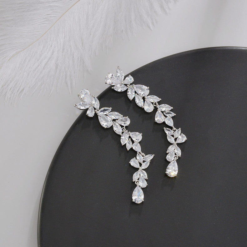 Wholesale Copper inlaid zircon intricate leaf earrings
