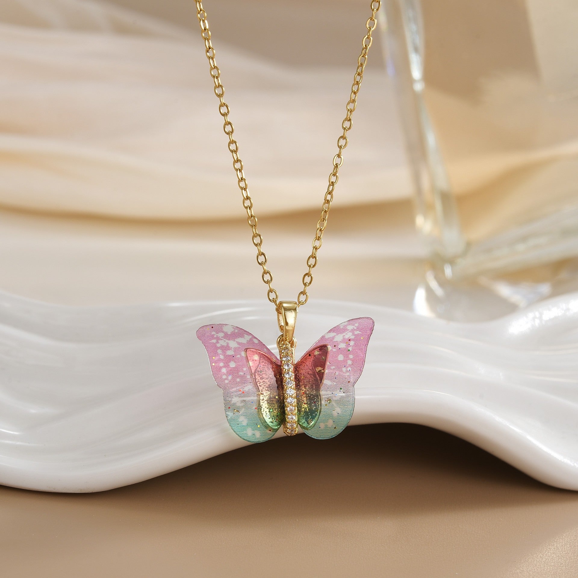 Wholesale Colored resin butterfly titanium steel locking chain