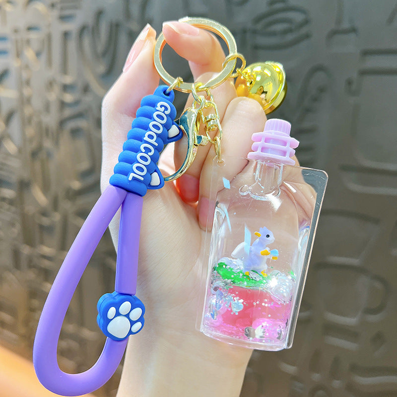 Wholesale Oil Filled Dinosaur Jelly Bottle Cute Liquid Quicksand Pendant Keychain