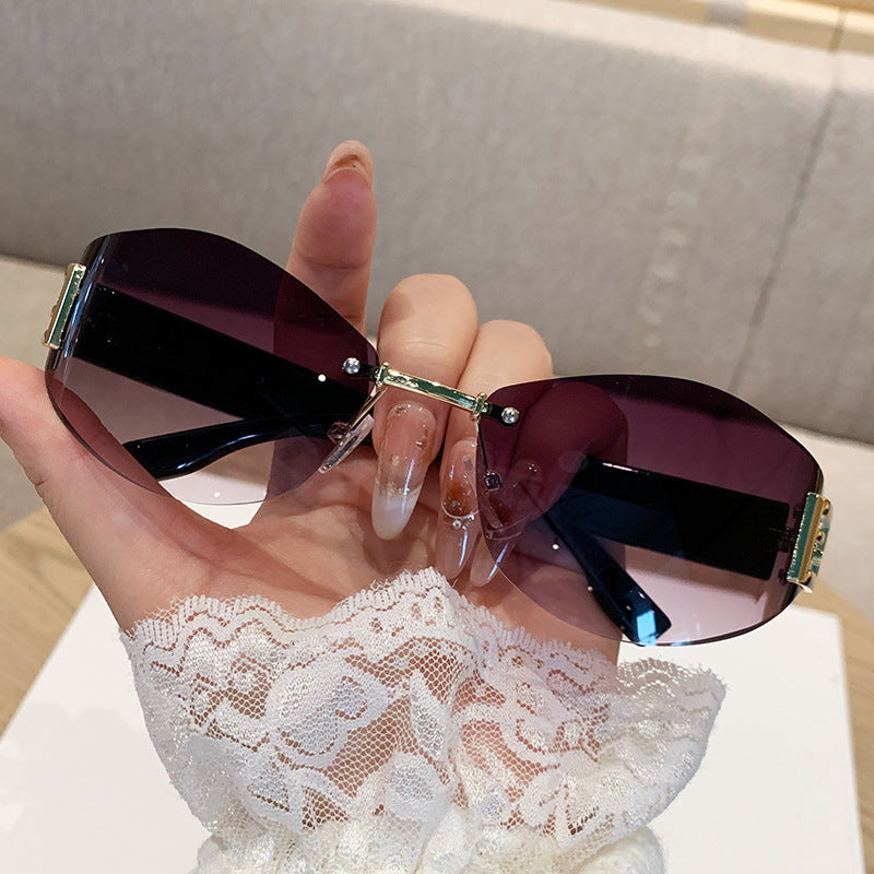 Wholesale Retro rimless oval curved lens sunglasses