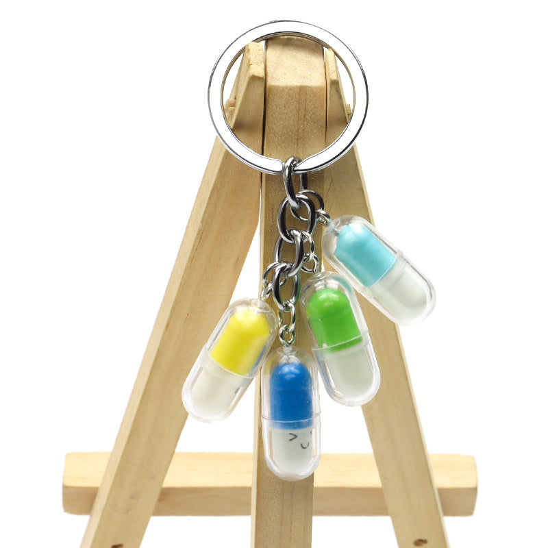 Wholesale Acrylic Cute Smiley Face Capsule Pendant Keychain