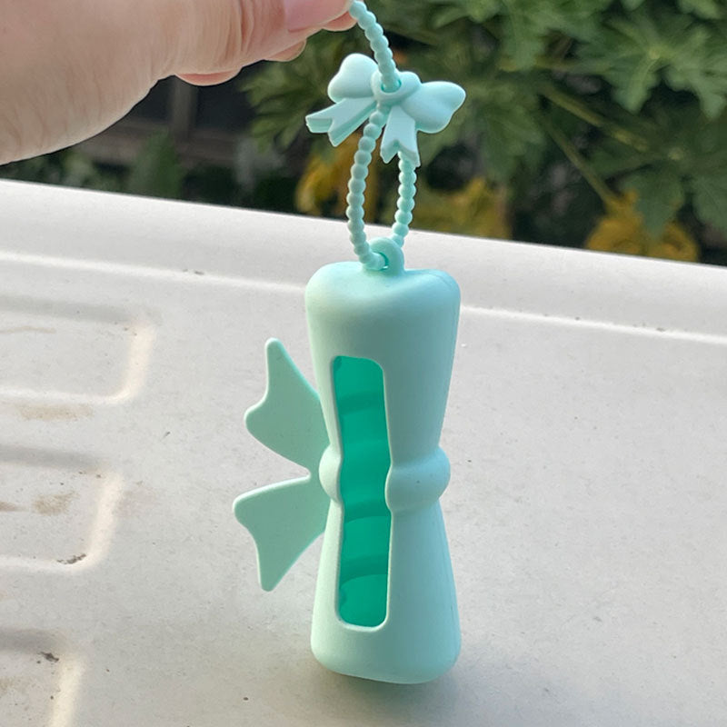 Wholesale Lipstick case silicone protective case bow lipstick bag keychain